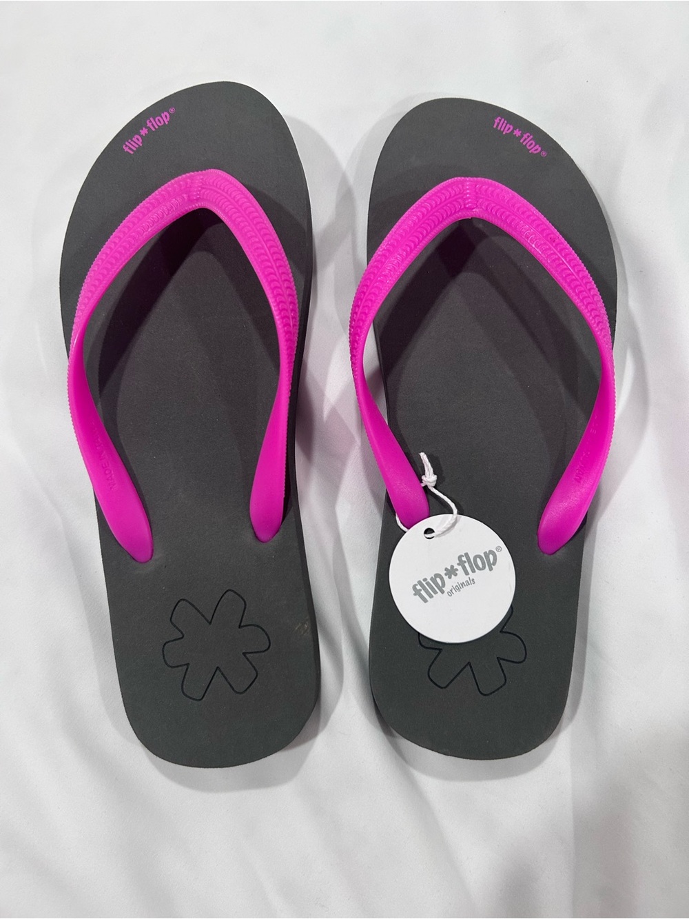 Women's Hot Pink Flip Flops on Black Footbed